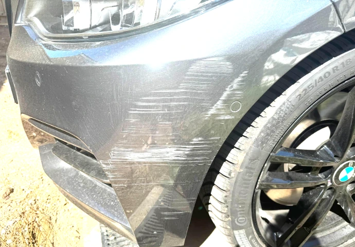 Mobile Bumper scuff Before
