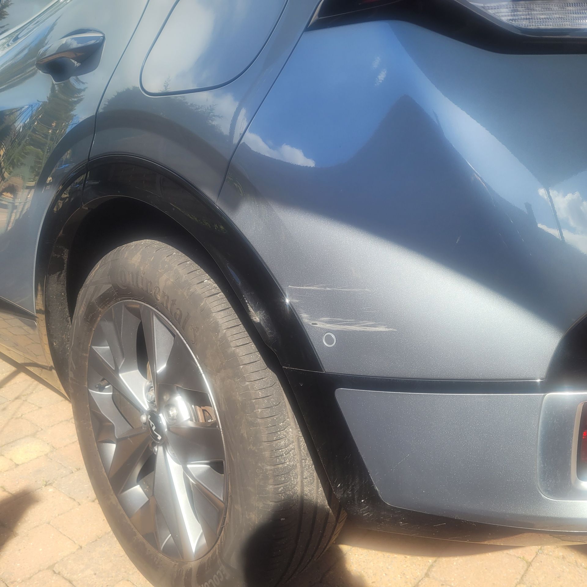 Bumper scuff before repair